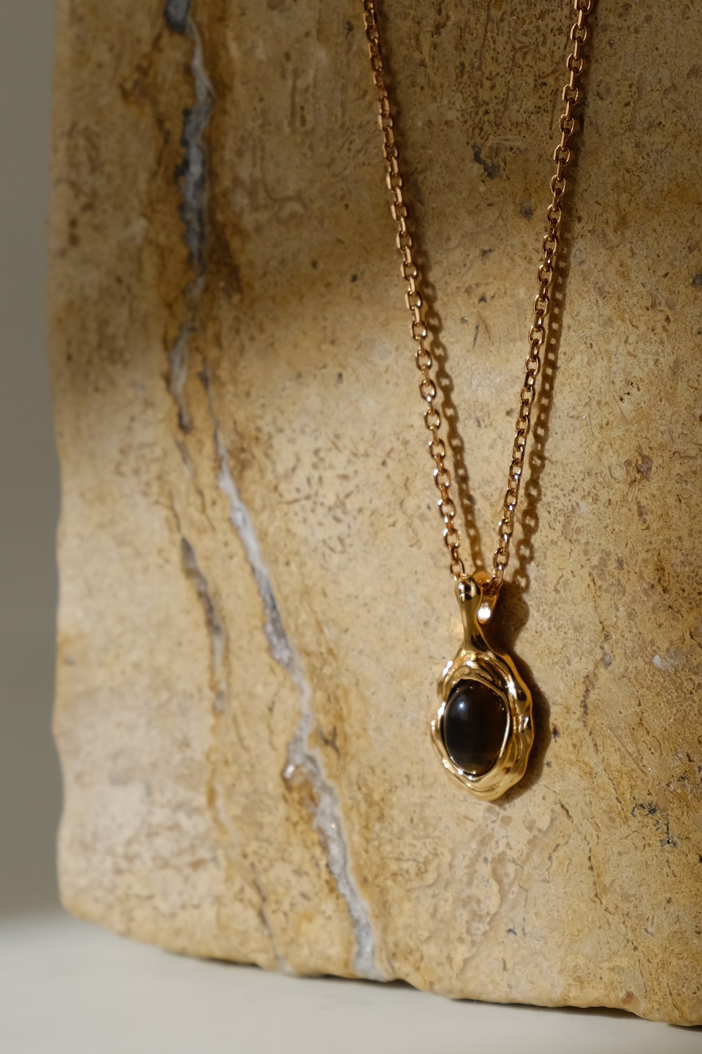 A Comm Amour Necklace - Brass with silver needles and natural tiger eye stone